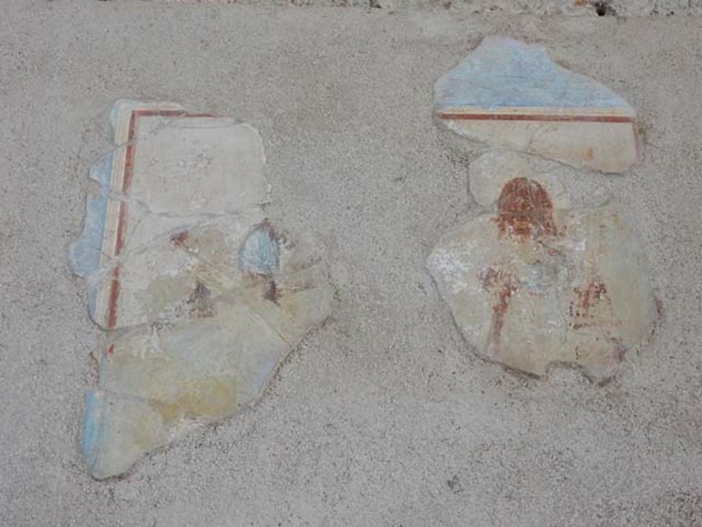 I.6.11 Pompeii. May 2015. East wall of atrium. Remains of wall painting from south side of the door to the second cubiculum in the east wall of atrium. Photo courtesy of Buzz Ferebee.