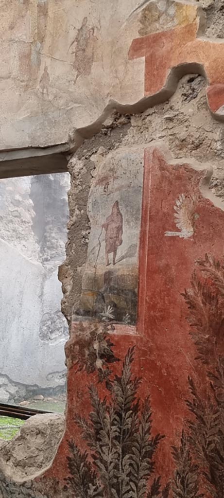 I.6.15 Pompeii. December 2023.
Room 9, east wall of small garden with detail of paintings on south side of window.
Photo courtesy of Miriam Colomer.