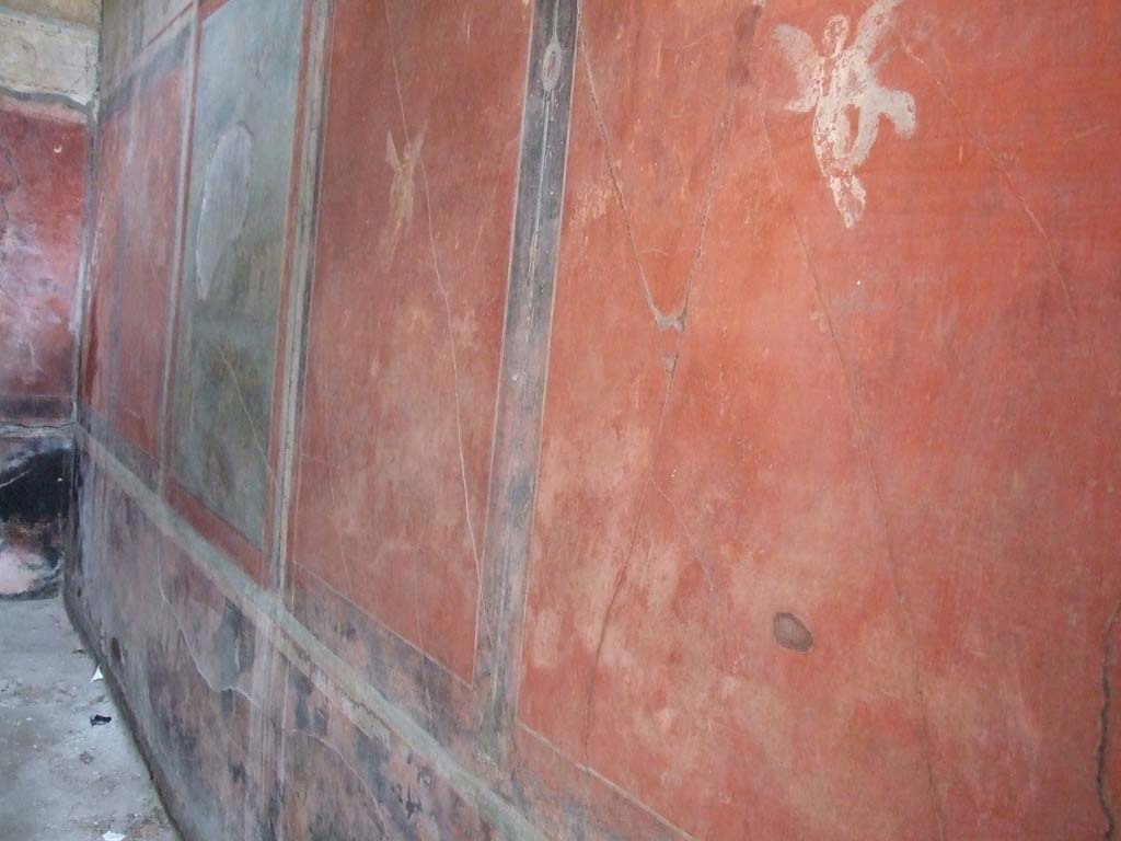 I.7.7 Pompeii. December 2006. Looking along east wall of triclinium from south-east corner.