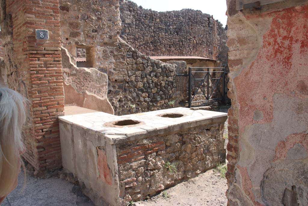 I.7.8 Pompeii. September 2017. Looking through entrance towards east side of bar-room, with side entrance at I.7.9.
Photo courtesy of Klaus Heese.