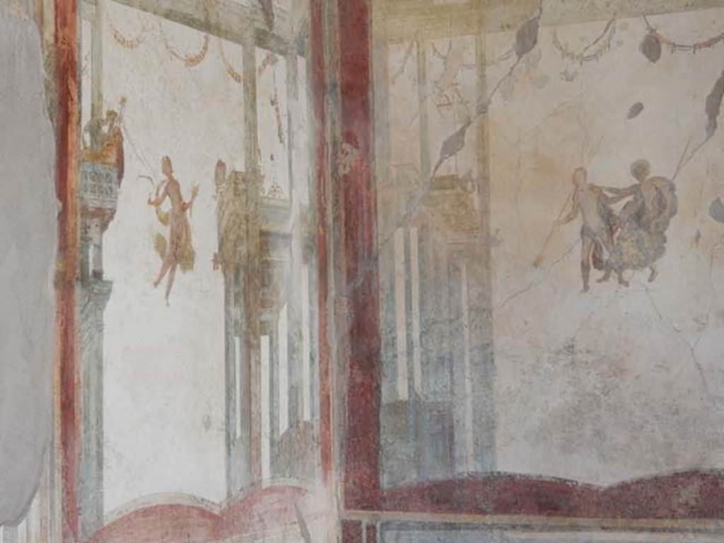 I.7.11 Pompeii. May 2017. Detail of painted panels in north-west corner of triclinium. Photo courtesy of Buzz Ferebee.
