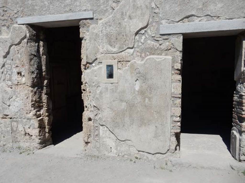 I.7.11 Pompeii. May 2017. Looking east towards doorways on south-east side of atrium. On the left is the doorway to a cubiculum, on the south side of entrance at I.7.11.  On the right is the doorway into the triclinium, in the south-east corner of the atrium.  Photo courtesy of Buzz Ferebee.
