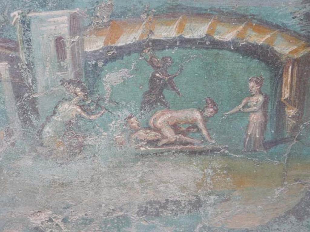 I.7.12 Pompeii. May 2017. Detail from painted panel on north end of west side of summer triclinium. Photo courtesy of Buzz Ferebee.
