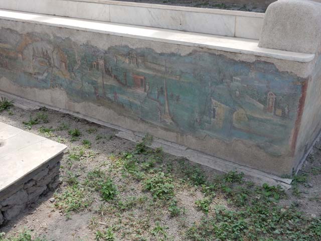 I.7.12 Pompeii. May 2017. Painted panel on inside of west side of summer triclinium.  Photo courtesy of Buzz Ferebee.

