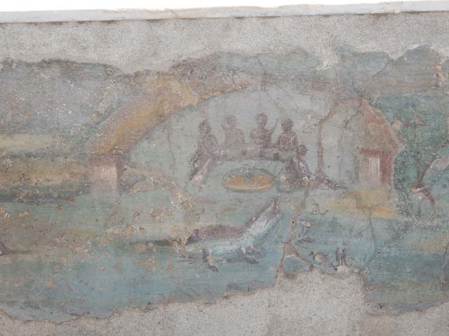 I.7.12 Pompeii. May 2017. Detail of painted panel on inside of west side of triclinium towards south end. Photo courtesy of Buzz Ferebee.
