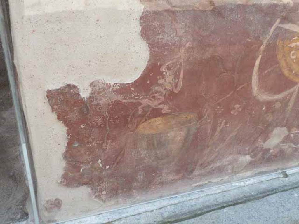 I.8.1 Pompeii. May 2010.  Painted decoration on east end of counter front.
