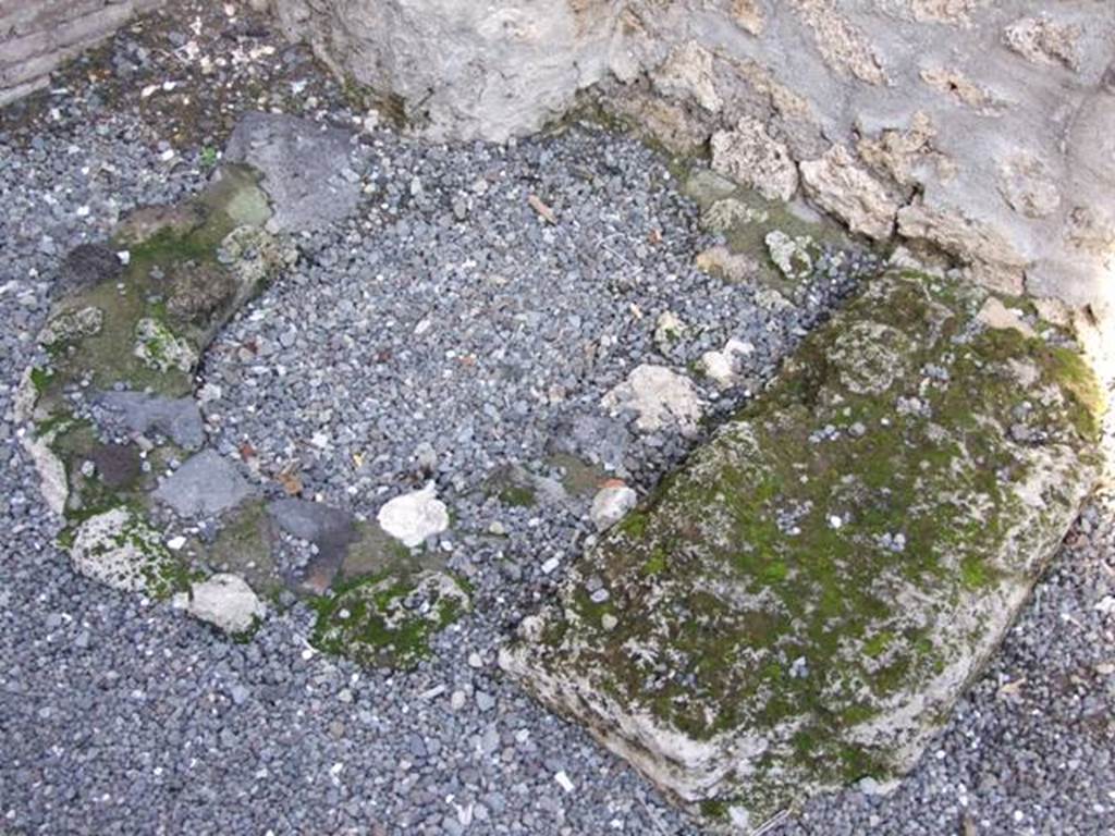 I.8.6 Pompeii. December 2007. North-east corner of shop, remains of podium and fusorium (kitchen drain?).