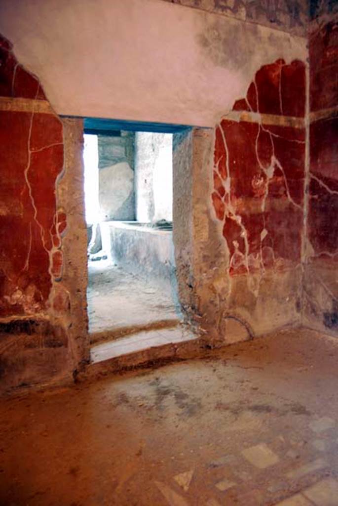 I.8.9 Pompeii. May 2013. Room 3, looking towards north wall with the doorway to caupona. Photo courtesy of Paula Lock.
