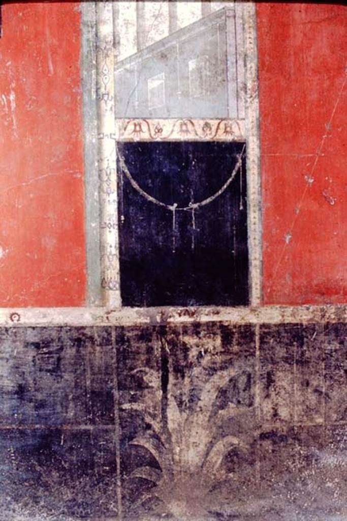 I.8.9 Pompeii, 1968.  Room 7, black zoccolo of east wall of triclinium with painted plant. 
Photo by Stanley A. Jashemski.
Source: The Wilhelmina and Stanley A. Jashemski archive in the University of Maryland Library, Special Collections (See collection page) and made available under the Creative Commons Attribution-Non Commercial License v.4. See Licence and use details.
J68f0607
