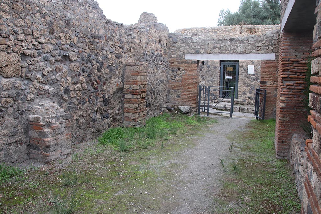 I.8.11 Pompeii. October 2024. Looking east towards entrance doorway. Photo courtesy of Klaus Heese.