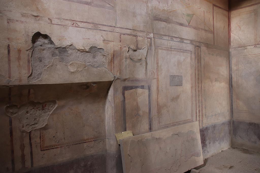 I.8.17 Pompeii. October 2024. Room 14, looking east along north wall. Photo courtesy of Klaus Heese.