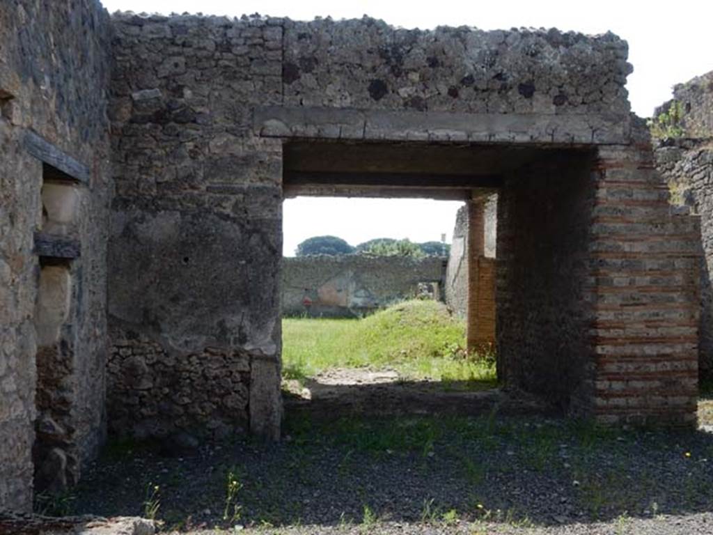 I.9.3 Pompeii. May 2015. Looking across atrium towards tablinum, from I.9.4.
Photo courtesy of Buzz Ferebee.