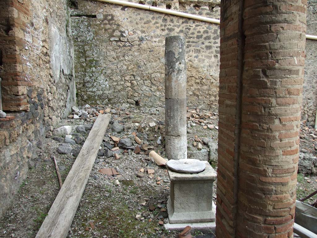 I.9.3 Pompeii. March 2009. Room 6, east side of portico of garden area.