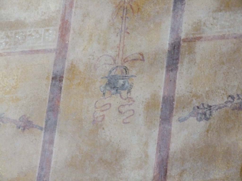 I.9.3 Pompeii. March 2009. Room 10, painted decoration of a “hanging bucket” on east wall.