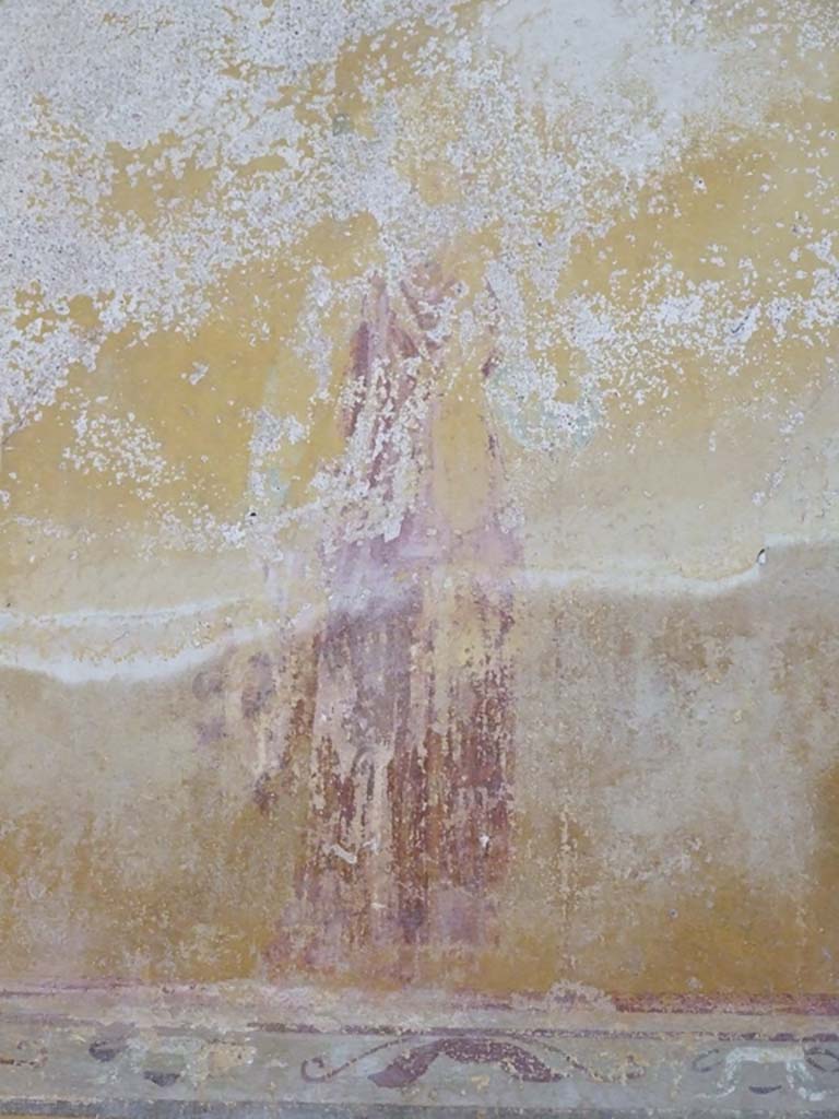 I.9.3 Pompeii. March 2009. Room 10, painted decoration from upper area of south wall.
According to PPM, this was a bacchic figure.