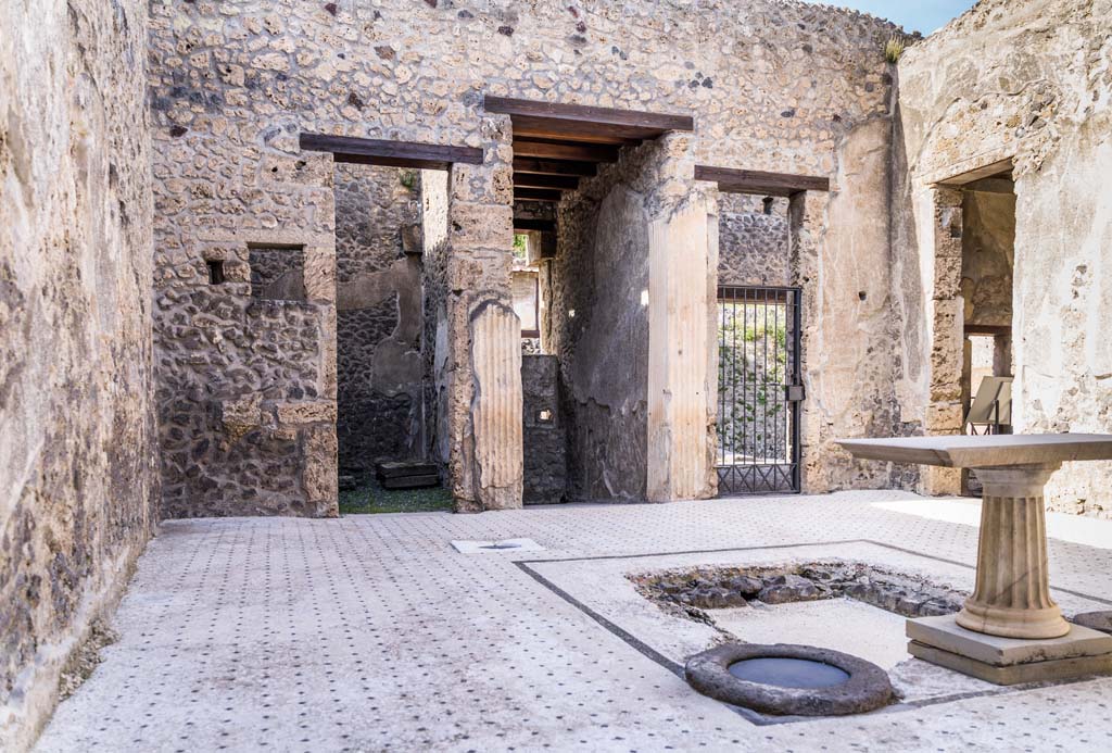 I.9.5 Pompeii. April 2022. Room 3, looking north across atrium from south-west corner. Photo courtesy of Johannes Eber.