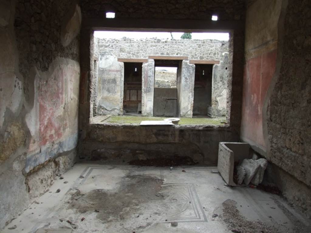 I.9.14 Pompeii. March 2009. Room 6. Tablinum. Looking south through window to atrium and front of house.