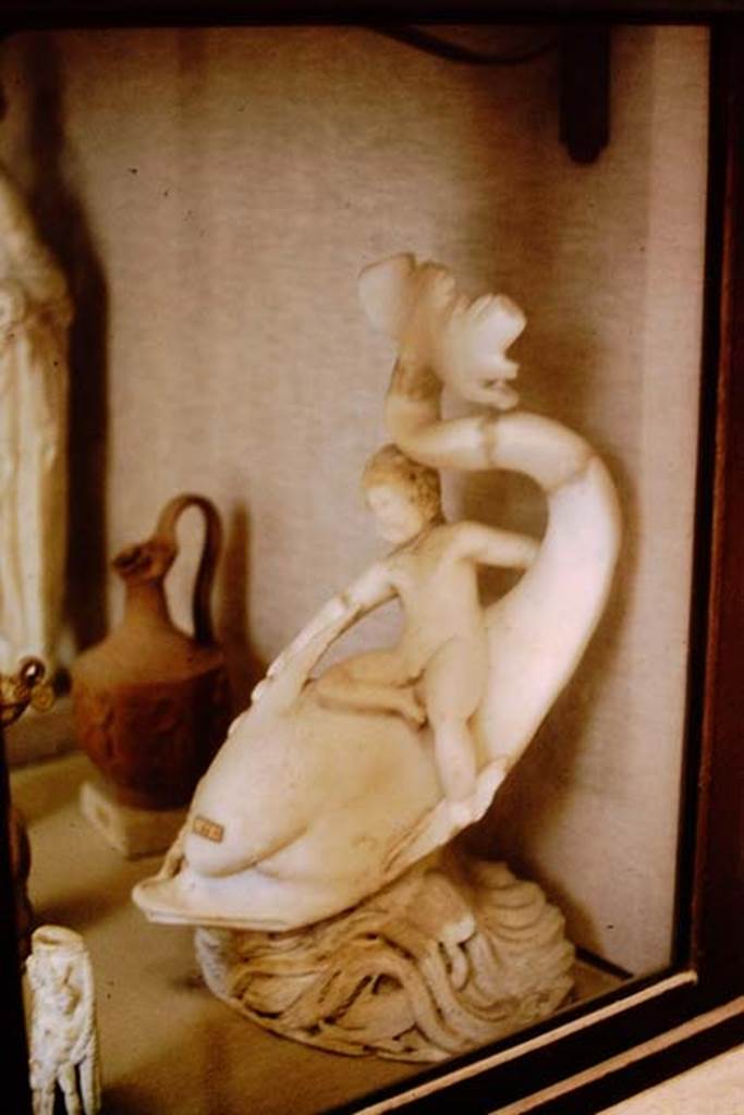 I.9.14 Pompeii. 1964. Marble fountain statuette. Amorino on dolphin with octopus. Photo by Stanley A. Jashemski.
Source: The Wilhelmina and Stanley A. Jashemski archive in the University of Maryland Library, Special Collections (See collection page) and made available under the Creative Commons Attribution-Non Commercial License v.4. See Licence and use details.
J64f2052