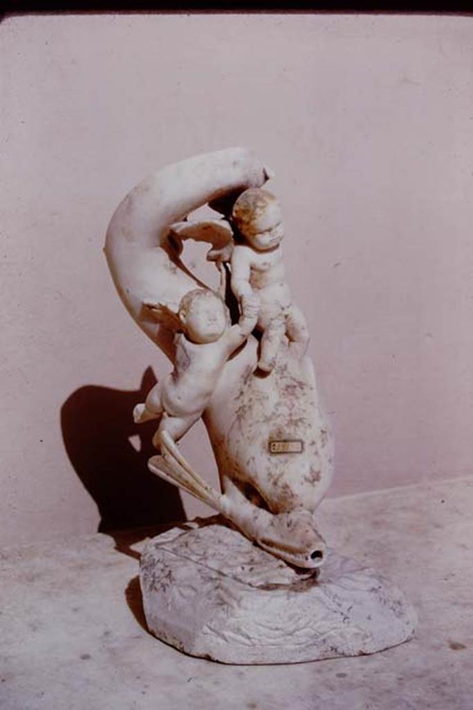 I.9.14 Pompeii. 1966. Two cupids riding on dolphin. Photo by Stanley A. Jashemski.
Source: The Wilhelmina and Stanley A. Jashemski archive in the University of Maryland Library, Special Collections (See collection page) and made available under the Creative Commons Attribution-Non Commercial License v.4. See Licence and use details.
J66f0736