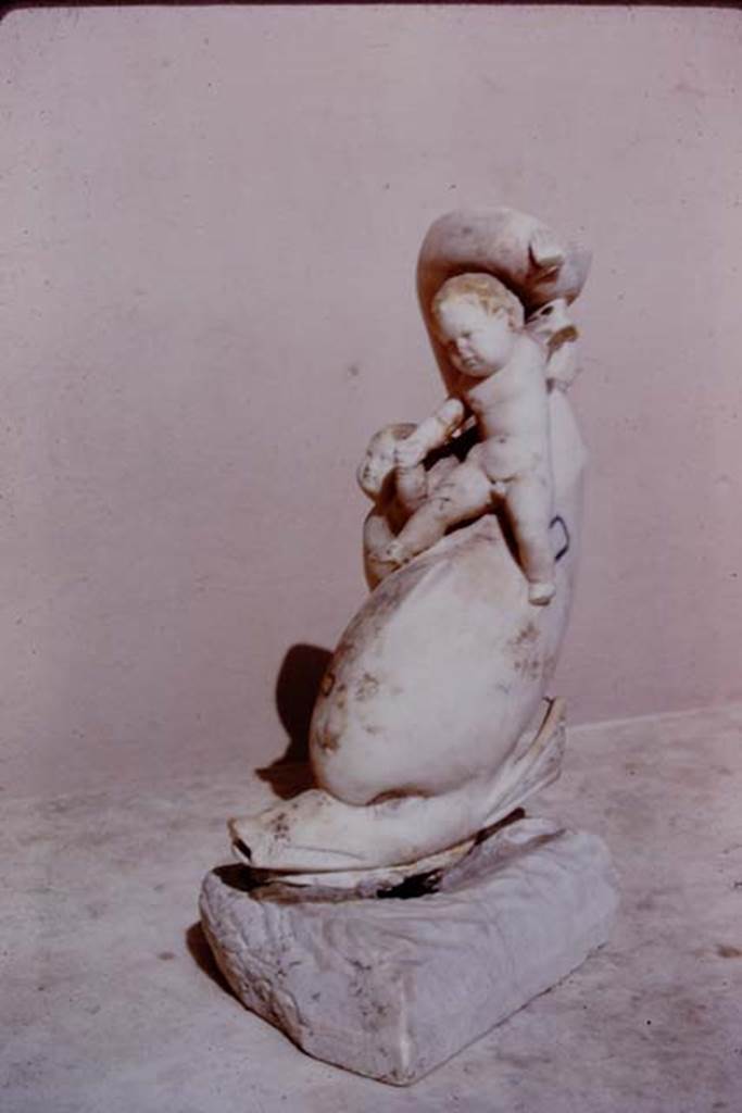 I.9.14 Pompeii. 1966. Two cupids riding on a dolphin. Photo by Stanley A. Jashemski.
Source: The Wilhelmina and Stanley A. Jashemski archive in the University of Maryland Library, Special Collections (See collection page) and made available under the Creative Commons Attribution-Non Commercial License v.4. See Licence and use details.
J66f0737