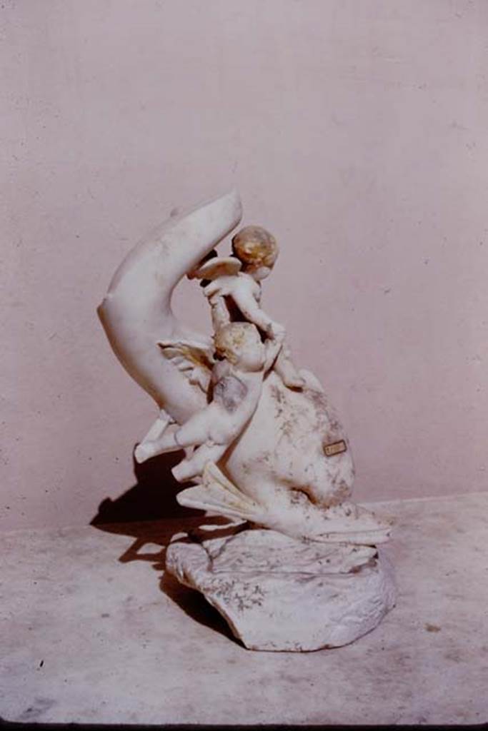 I.9.14 Pompeii. 1966. Two cupids riding on a dolphin. Photo by Stanley A. Jashemski.
Source: The Wilhelmina and Stanley A. Jashemski archive in the University of Maryland Library, Special Collections (See collection page) and made available under the Creative Commons Attribution-Non Commercial License v.4. See Licence and use details.
J66f0738