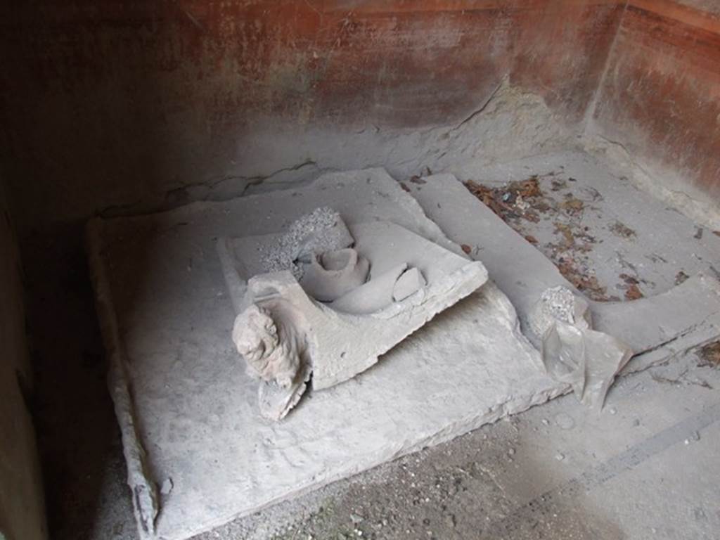 I.9.14 Pompeii. March 2009. Room 13, grondaio or antefisse fittili or water-spout on east side of floor.