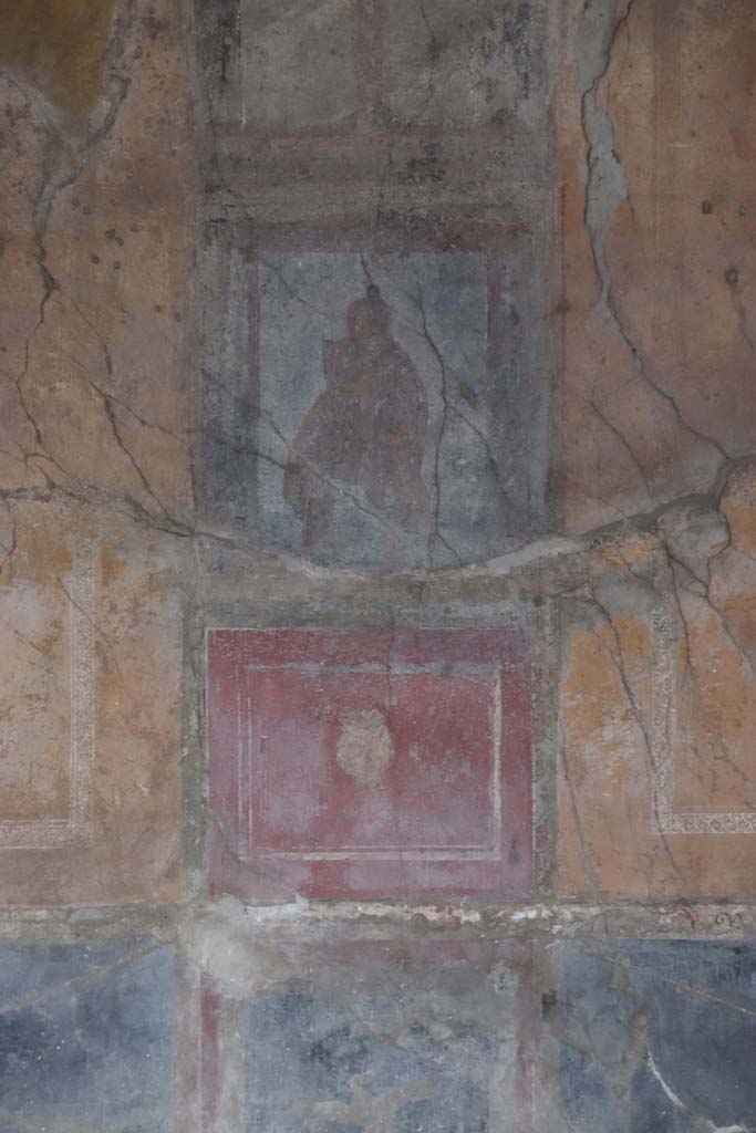 I.10.4 Pompeii. September 2021. 
Room 18, painted panel from centre of east wall. Photo courtesy of Klaus Heese.
