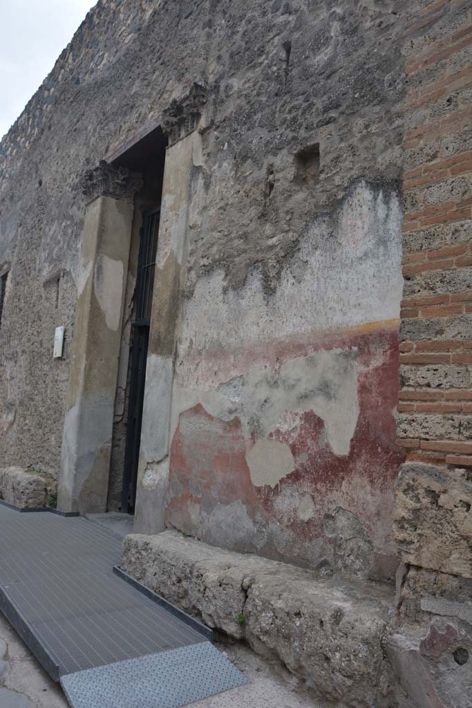I.10.4 Pompeii. December 2006. Painted plaster on front wall to right of entrance, and faded graffiti.
