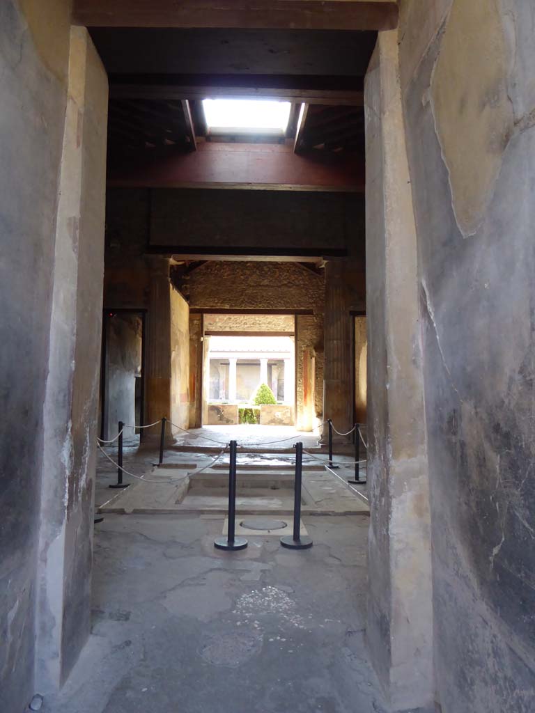 I.10.4 Pompeii. October 2001. Looking south along entrance corridor, across impluvium in atrium towards the garden area. Photo courtesy of Peter Woods. 
