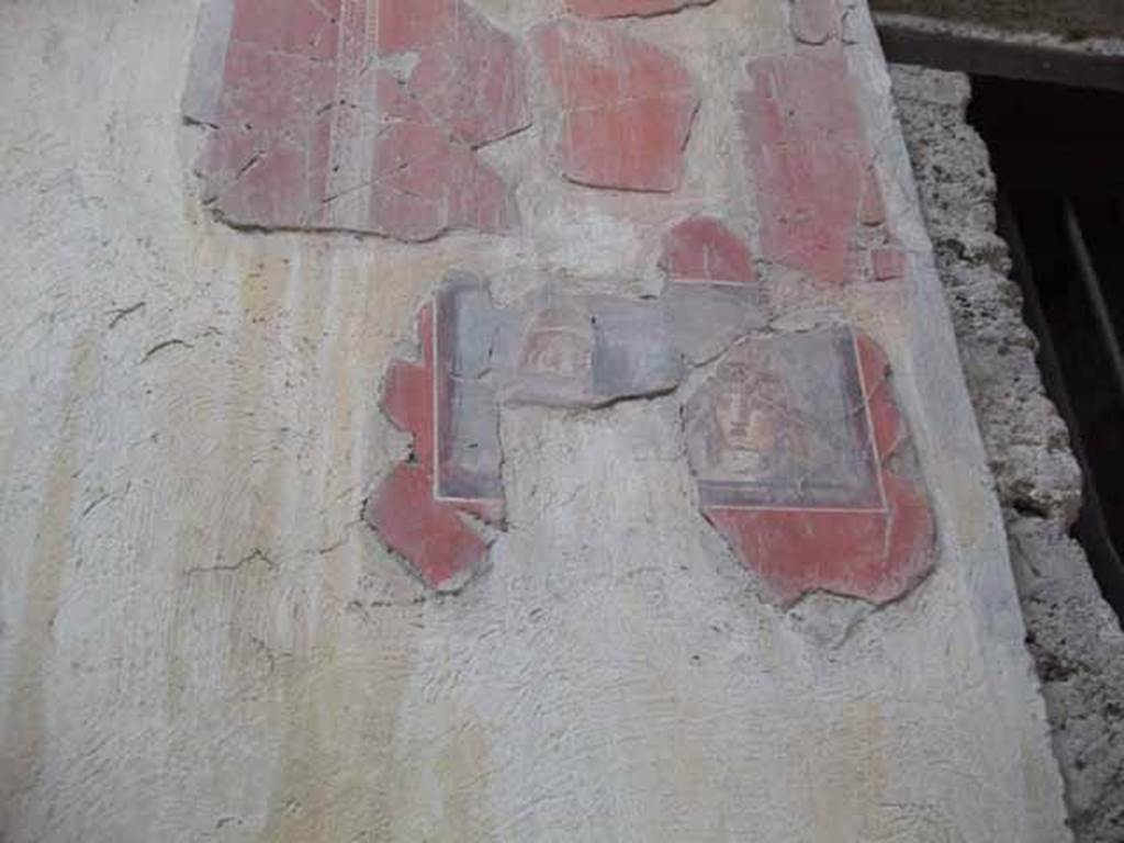 I.10.4 Pompeii. May 2010. West wall of atrium. Painting of theatrical masks.