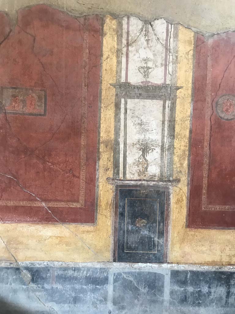 I.10.4 Pompeii. April 2019. West wall on south side of room 7, in south-west corner of atrium.
Photo courtesy of Rick Bauer.
