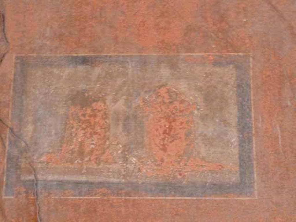 I.10.4 Pompeii. May 2010. West wall of atrium, faded painted theatrical masks ?