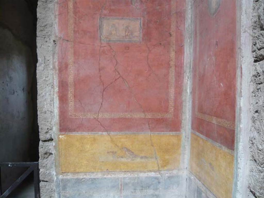 I.10.4 Pompeii. May 2012. Looking towards north wall in north-east corner of atrium, detail of painted panel with theatrical masks, and birds below. Photo courtesy of Buzz Ferebee.
