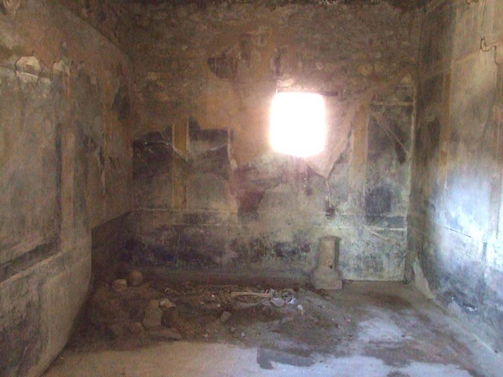 I.10.7 Pompeii. March 2009. Room 12, looking north in triclinium.  
According to Peters, the central pictures on the northern and eastern walls have almost completely disappeared.
The subject of the one in the centre of the northern wall was Paris and Hermes on Mount Ida.
See Peters, W.J.T. (1963): Landscape in Romano-Campanian Mural Paintings.The Netherland, Van Gorcum & Comp. (p.90)

