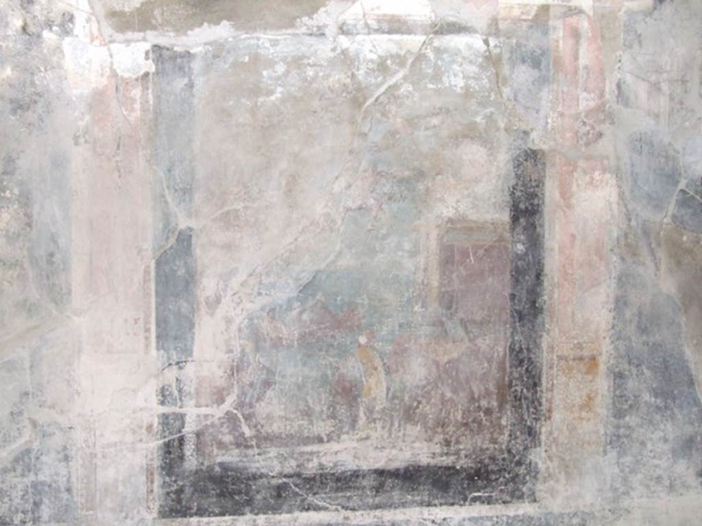 I.10.7 Pompeii. March 2009. Room 12, remains of the wall painting of the Daedalus and Icarus, from west wall of triclinium.
According to Peters, in 1963 this was becoming slightly indistinct and cracked.
See Peters, W.J.T. (1963): Landscape in Romano-Campanian Mural Paintings. The Netherlands, Van Gorcum & Comp., (p.90-1 & fig.76). 
