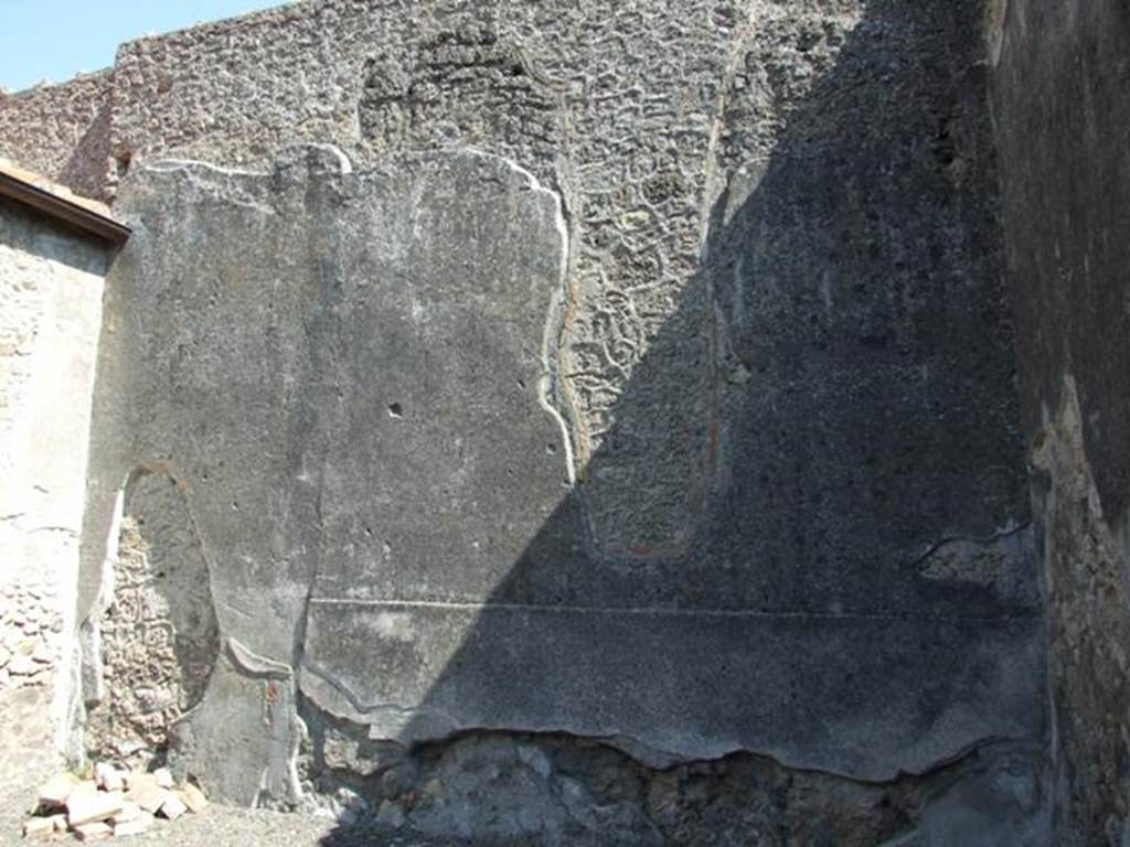I.10.8 Pompeii. March 2009. Room 4, east wall of workroom.  
According to La Rocca, de Vos, M & E, and Della Corte, in the large rustic workroom on the left side of the atrium, many of the workers left their names.
The names of the male workers included  Rarus, Rufus, Quietus, Onesimus and Primigenius.
The female workers  Gelaste and Salvilla.
The last-named woman was probably the one from CIL IV 8384, in the neighbouring room.
See La Rocca, E, de Vos, M & E, & Coarelli, F. (1981): Guida archeologica di Pompei. Milan: Mondadore (p.172)
See Della Corte, M., 1965.  Case ed Abitanti di Pompei. Napoli: Fausto Fiorentino. (p.301)

