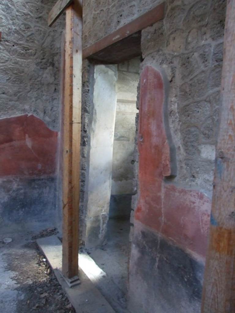 I.10.11 Pompeii. March 2009. Room 7, north wall on east side of doorway in cubiculum.  