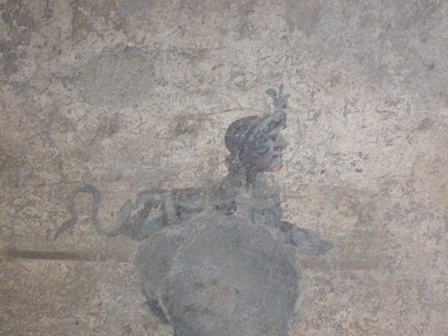 I.10.11 Pompeii. September 2021. Room 7, painted decoration on south wall. Photo courtesy of Klaus Heese.


