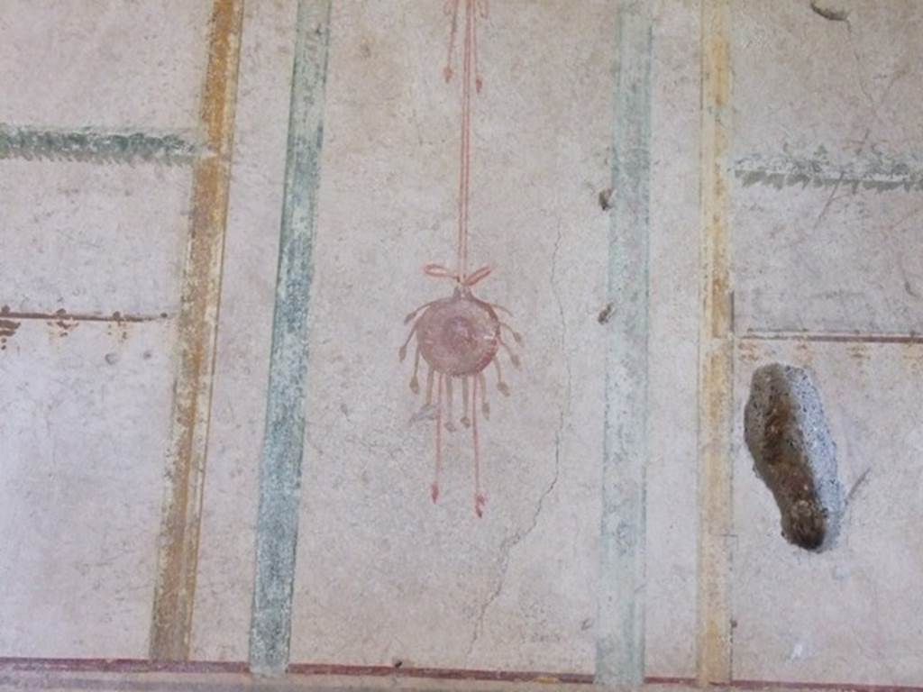 I.10.11 Pompeii.  March 2009.  Room 7.  Cubiculum.  West wall.  Painting of suspended tambourine.  See Bragantini, de Vos, Badoni, 1981. Pitture e Pavimenti di Pompei, Parte 1. Rome: ICCD.  (p.143).