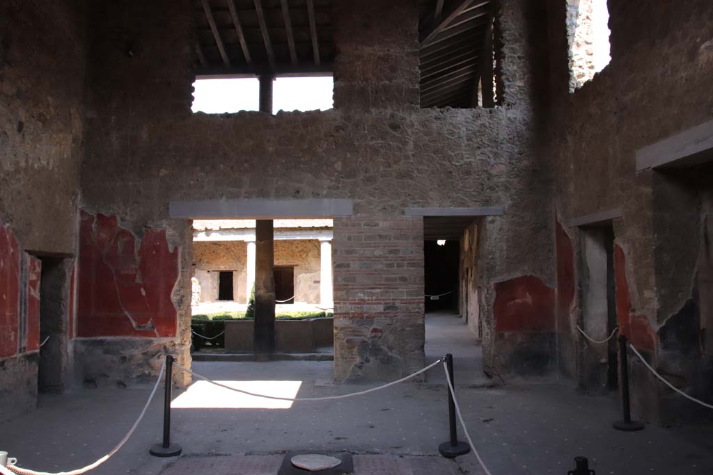 I.10.11 Pompeii. September 2021. Room 2, looking towards east side of atrium with doorway to peristyle. Photo courtesy of Klaus Heese.