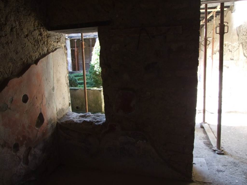 I.10.11 Pompeii. March 2009. Room 11, west wall of oecus, with doorway to east portico.