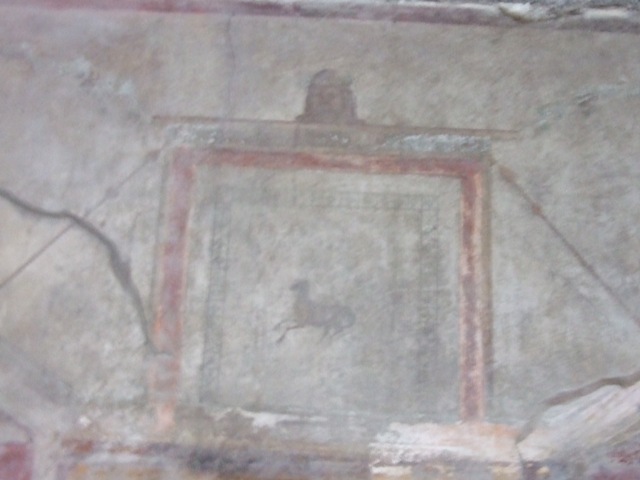 I.10.11 Pompeii.  March 2009.  Room 12.  Cubiculum.  North wall.  Top of wall at centre.  Painting of goat.
