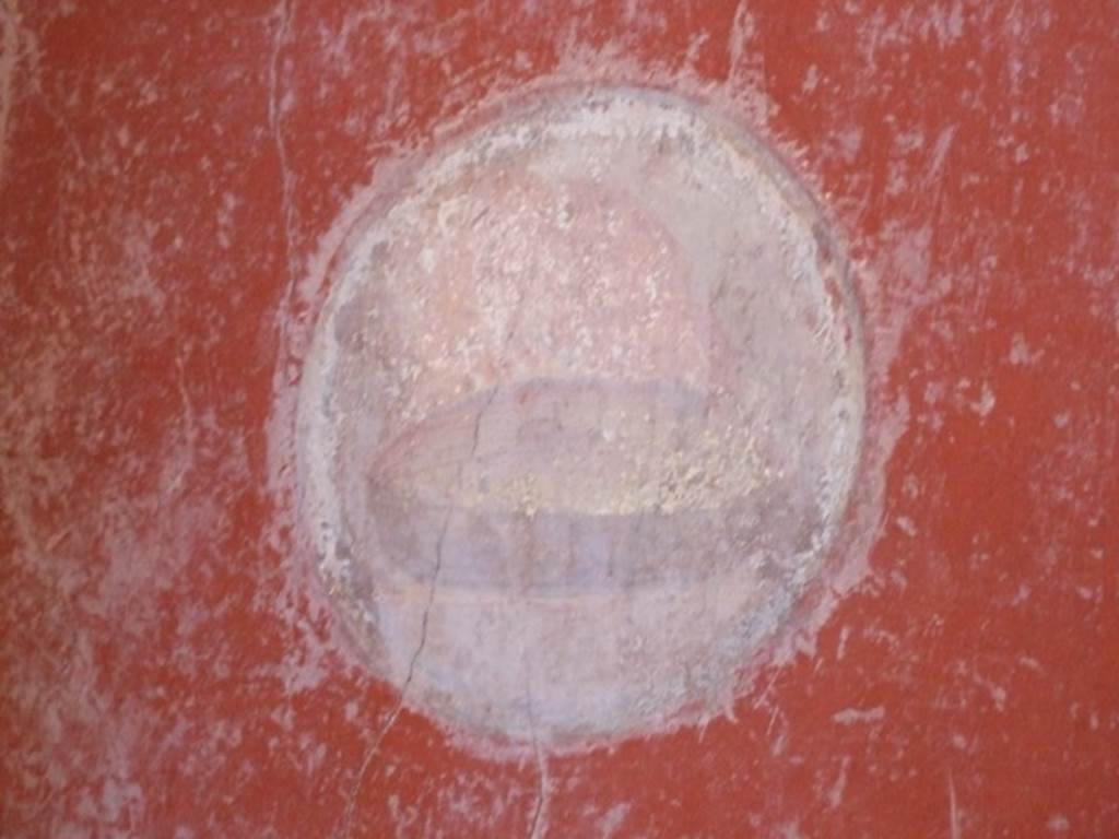 I.10.11 Pompeii. March 2009. Room 2, painted medallion of bread and plate from north-west corner of atrium. See Bragantini, de Vos, Badoni, 1981. Pitture e Pavimenti di Pompei, Parte 1. Rome: ICCD. 
