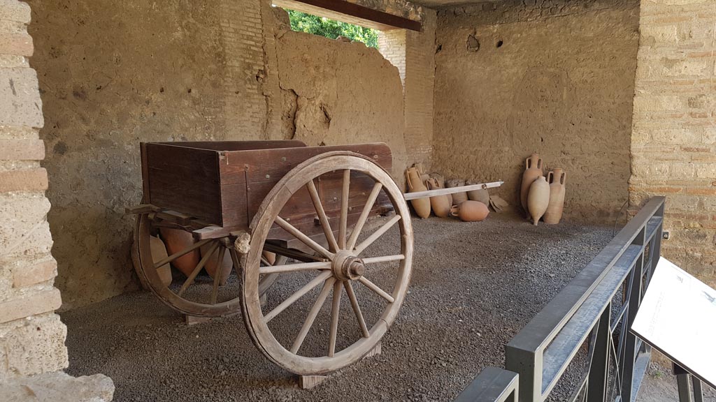 I.10.14 Pompeii. August 2023. Looking south along east side of stable towards blocked doorway. Photo courtesy of Maribel Velasco.
