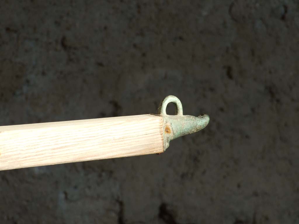 I.10.14 Pompeii. December 2006. Bronze terminal to connect cart to animals. 