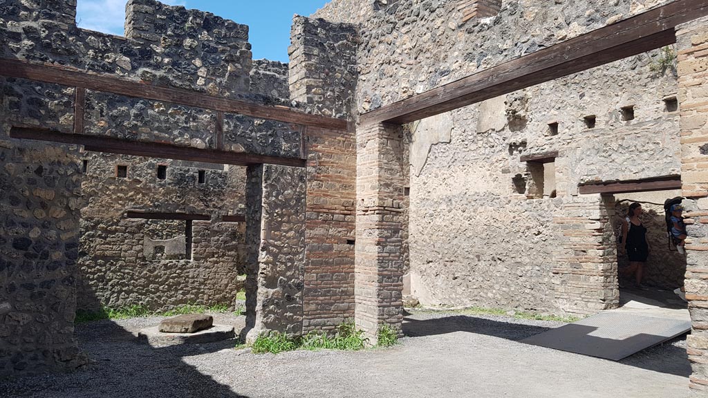 I.10.14 Pompeii. August 2023. Looking towards west wall, north-west corner and north wall, on right. Photo courtesy of Maribel Velasco.