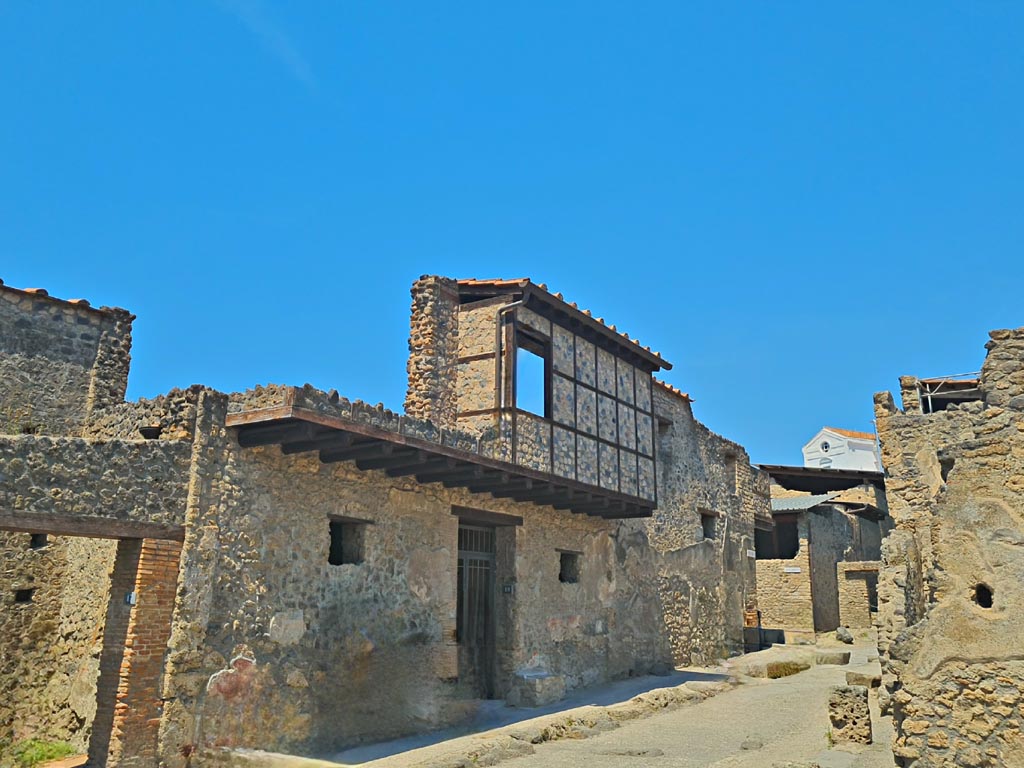 I.10.18 Pompeii. June 2024. Looking north along west side of Vicolo di Paquius Proculus. Photo courtesy of Giuseppe Ciaramella.