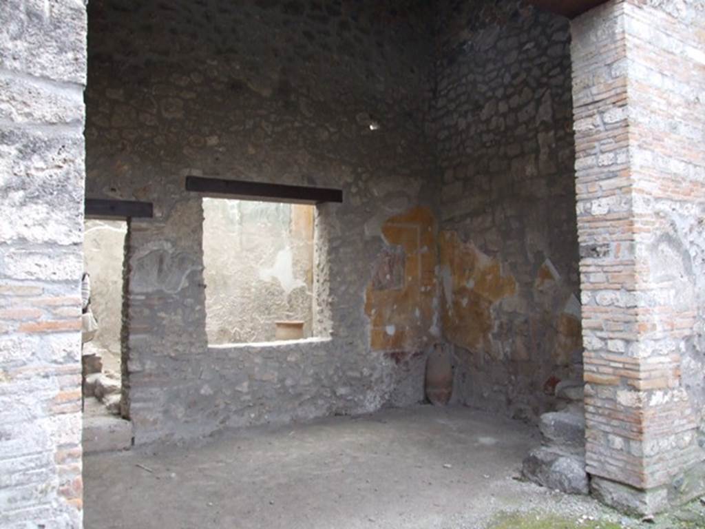 I.11.6 Pompeii. March 2009. Doorway of room 5, tablinum. Looking into the south-west corner.