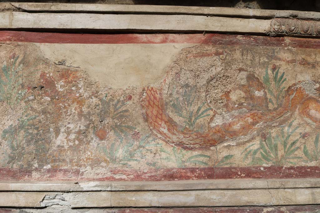 I.11.11 Pompeii. December 2018. Detail from painted Lararium on north wall of bar-room. Photo courtesy of Aude Durand.