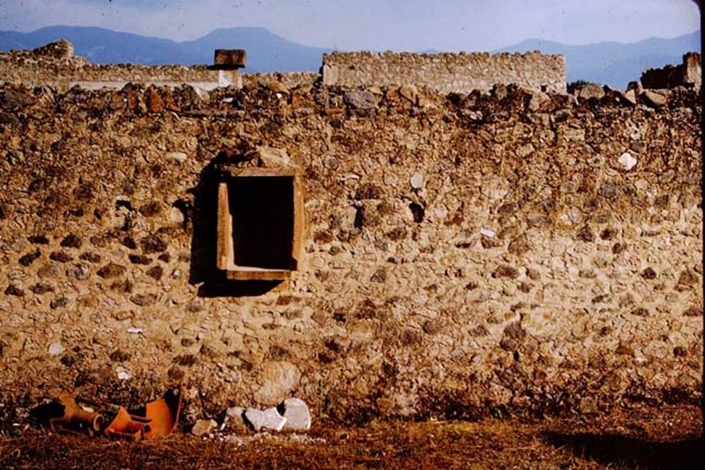 I.11.12 Pompeii. 1964. Aedicula niche on south wall of garden/vineyard, together with the small cavities which contained three small Herms. Photo by Stanley A. Jashemski.
Source: The Wilhelmina and Stanley A. Jashemski archive in the University of Maryland Library, Special Collections (See collection page) and made available under the Creative Commons Attribution-Non Commercial License v.4. See Licence and use details.
J64f1970
